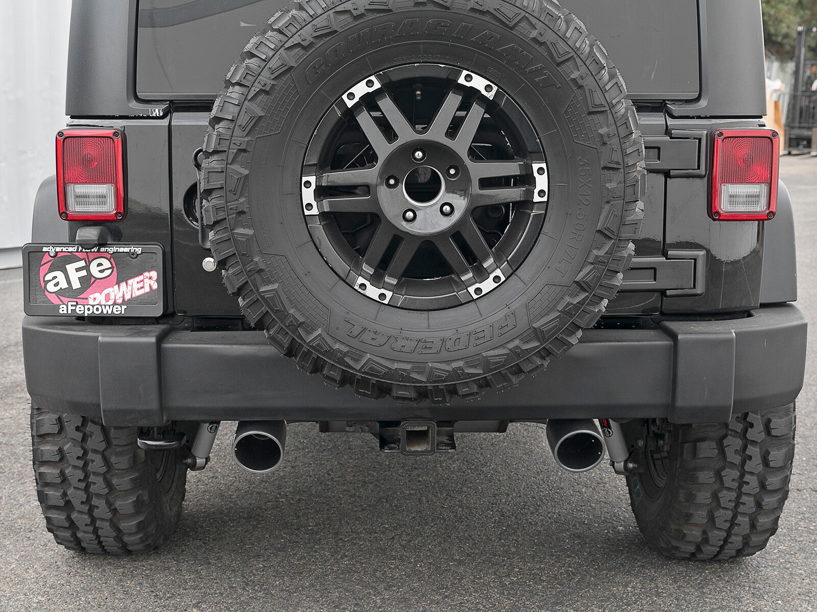 Rebel Series 2-1/2 Inch 409 Stainless Steel Cat-Back Exhaust System w/ Black Tips Jeep Wrangler (JK) 07-18 V6-3.6L/3.8L aFe Power