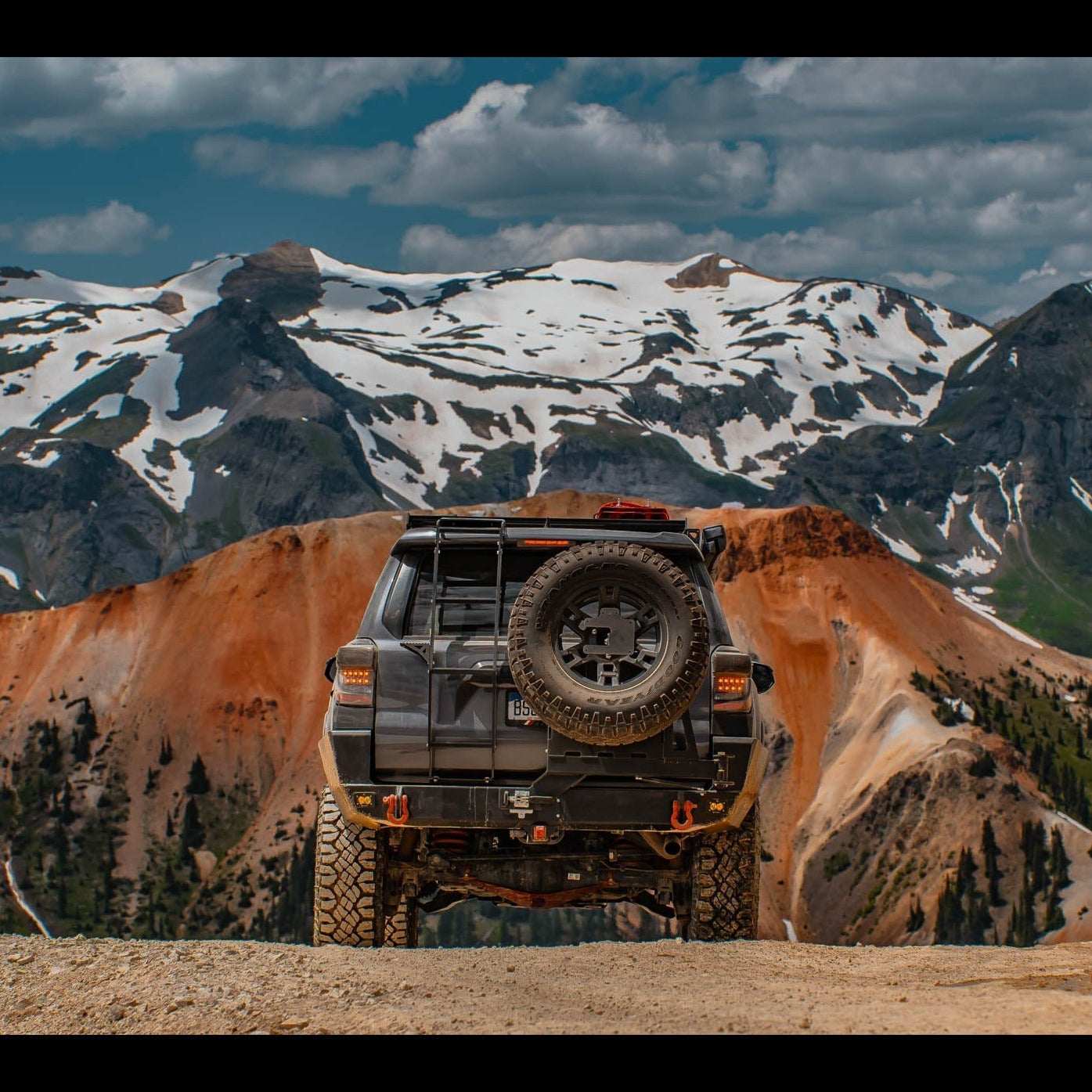 4Runner Summit Hatch Ladder for 5th Gen models, 2010-2024, showcased on a rugged mountain landscape.
