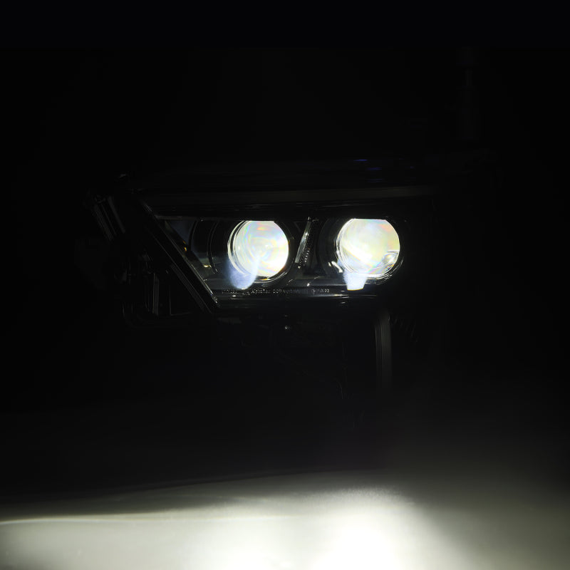 AlphaRex LUXX-Series black headlights for 2022-2023 Toyota Tundra with white daytime running lights.