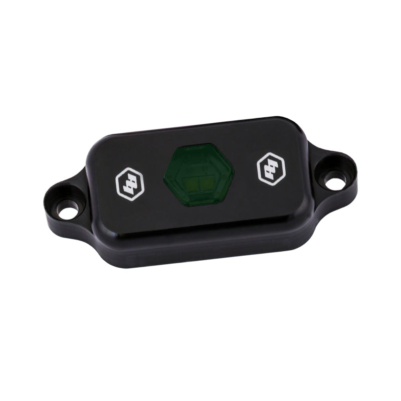 Baja Designs green LED rock light with a sleek black housing, designed for offroad vehicle illumination.