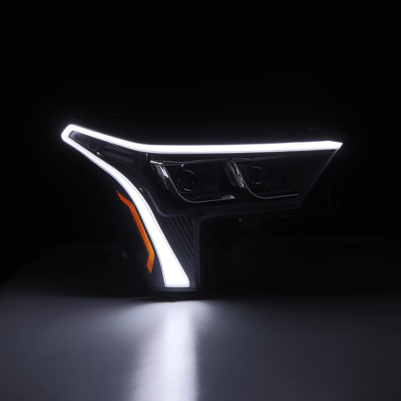 AlphaRex LUXX-Series black headlights for 2022-2023 Toyota Tundra with white daytime running lights.