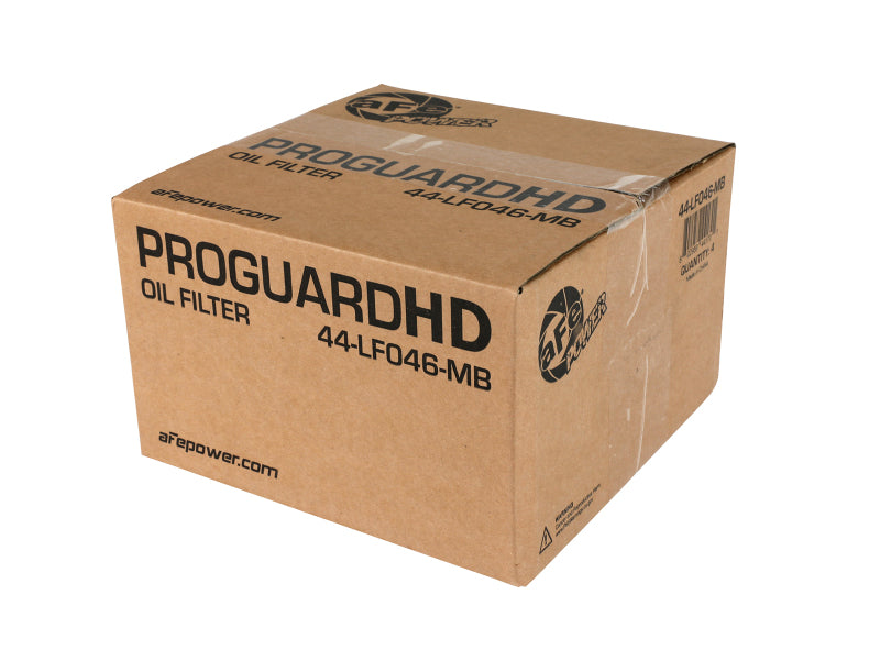 Brown cardboard box labeled "PROGUARD Oil Filter" with product details, designed for automotive maintenance.