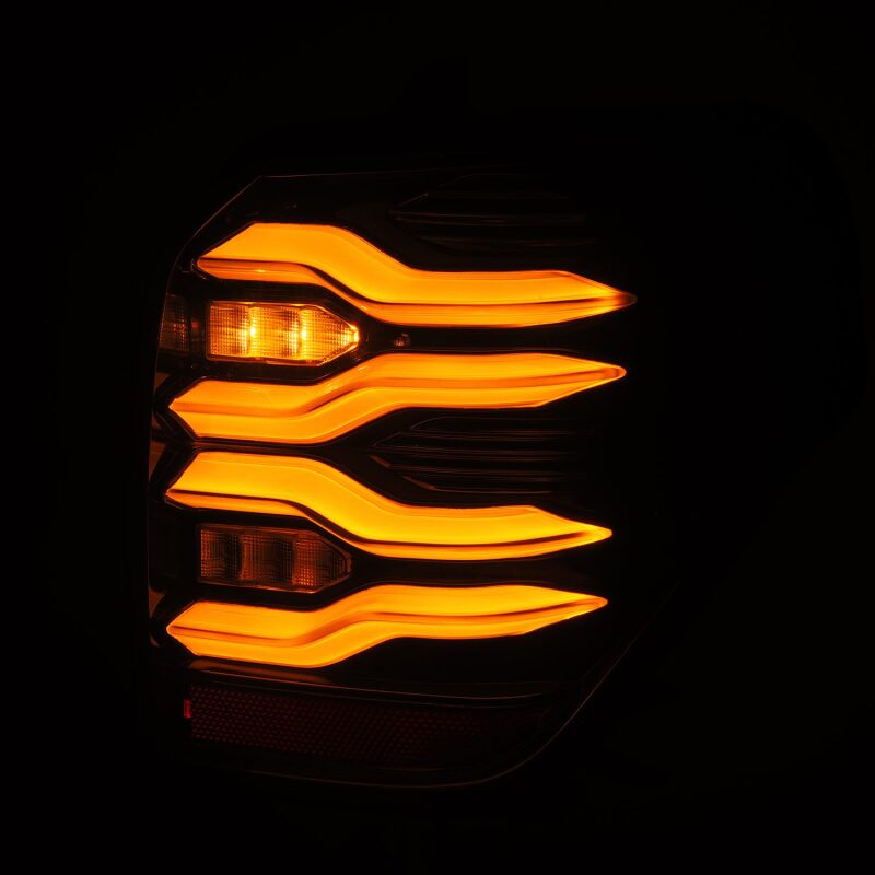 AlphaRex LUXX LED taillights for 10-21 Toyota 4Runner in black, featuring sequential signal and active lighting design.