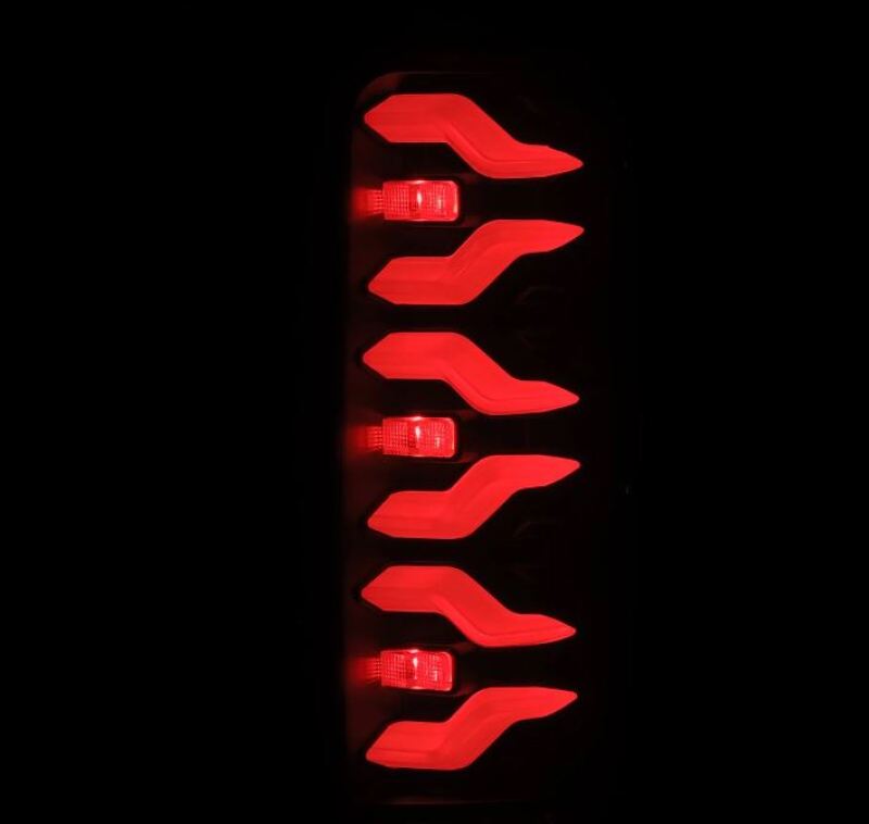 AlphaRex Luxx-Series LED tail lights for 87-96 Ford Bronco and F-150, featuring a sleek black design and bright red illumination.