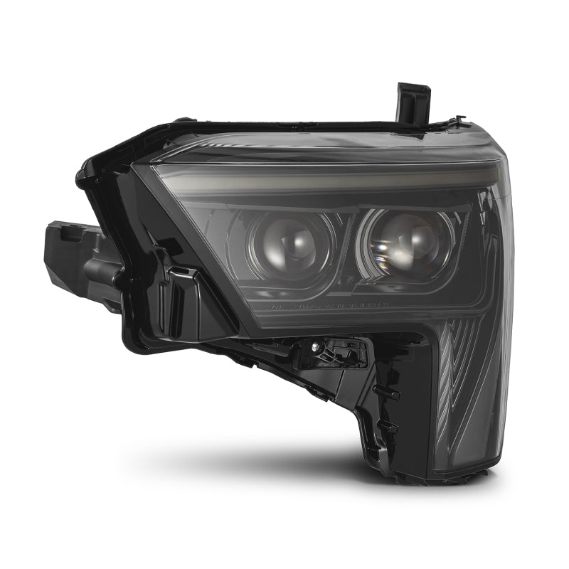 AlphaRex LUXX-Series headlights for 2022-2023 Toyota Tundra in alpha-black with amber daytime running lights.