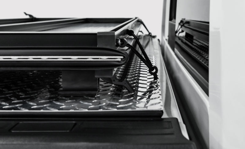 Access LOMAX 2022+ Rivian R1T 4ft 6in Bed (w/ OEM Tonneau Track) Folding Hard Cover - Black Urethane