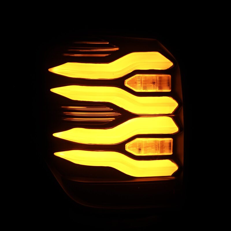 AlphaRex LUXX LED taillight for 10-21 Toyota 4Runner, featuring a black finish with sequential amber signals.