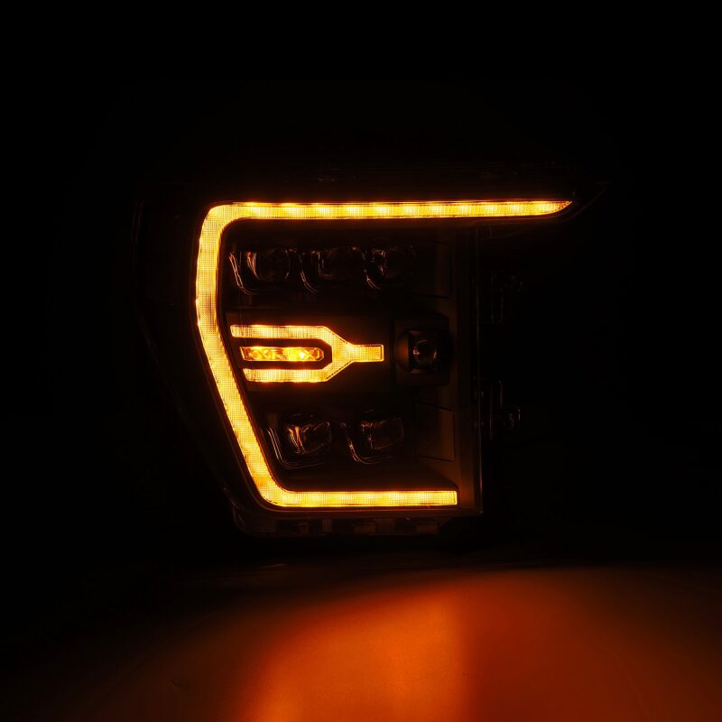 AlphaRex NOVA LED projector headlights for 21-22 Ford F-150, featuring plank style design with sequential signal lights.