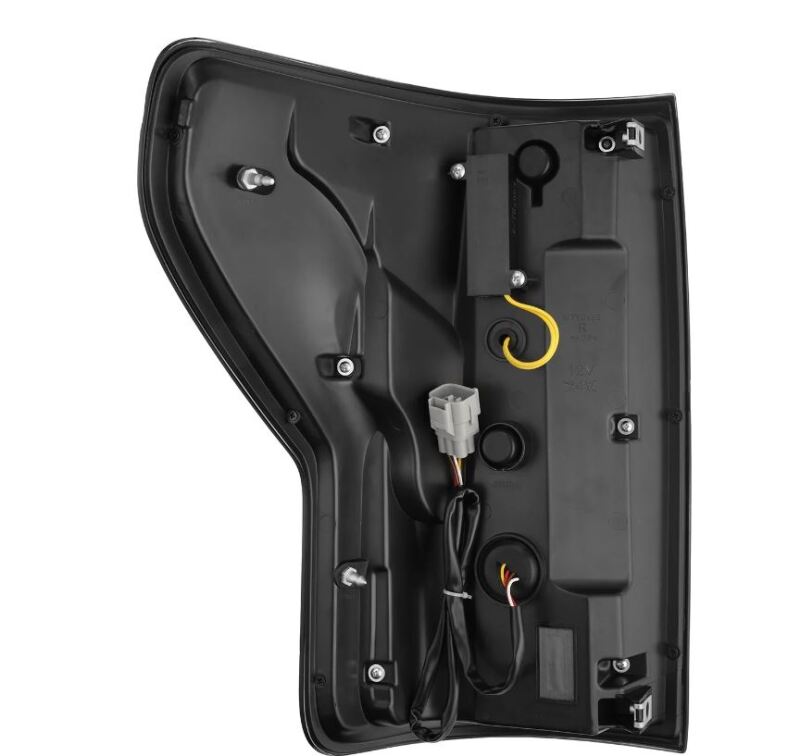AlphaRex 07-13 Toyota Tundra Nova-Series LED tail lights in black, showcasing the back view with wiring and mounting details.