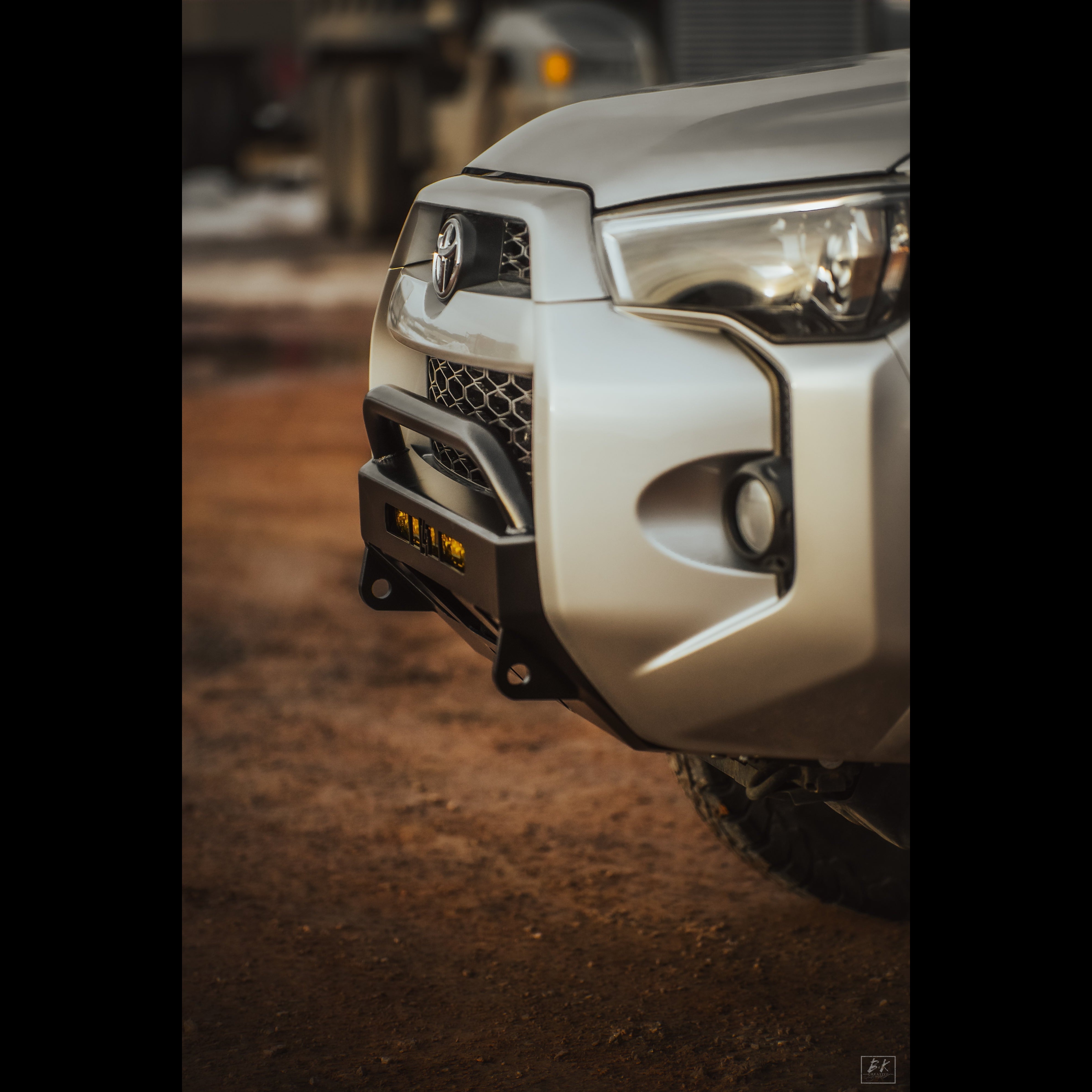 Lo-Pro winch bumper for 2014-2024 Toyota 4Runner, showcasing a sleek design and durable construction for offroad use.