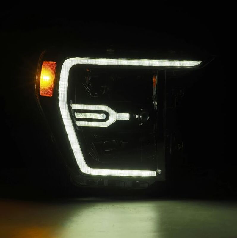 AlphaRex Luxx-Series projector headlights for 2021-2022 Ford F150 in alpha-black with sequential signal and active light.