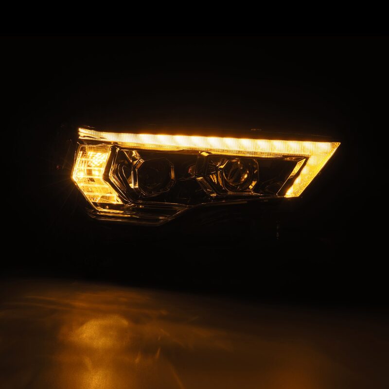 AlphaRex LUXX-Series LED projector headlights for 14-22 Toyota 4Runner with chrome finish, sequential signal, and DRL.