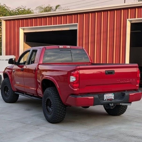 2014-2021 Toyota Tundra with aftermarket bedsides, showcasing a rugged offroad style and enhanced tire clearance.