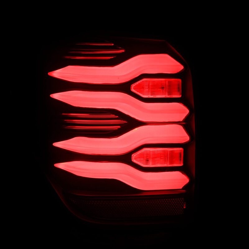 AlphaRex LUXX LED taillights for 10-21 Toyota 4Runner in black and red with sequential signal and active light features.