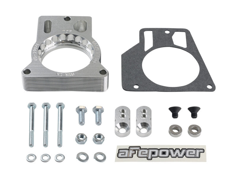 AFE Silver Bullet throttle body spacer kit for GM Trucks 2500/3500, including hardware and gasket for V8 engines.