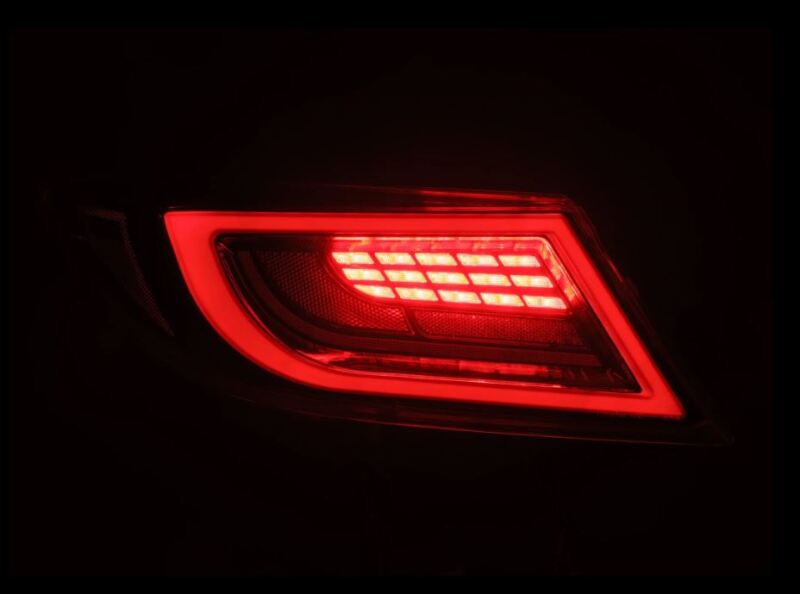 AlphaRex 22-24 Toyota GR86 LUXX LED taillight in Alpha-Black, featuring a sleek design with bright red illumination.