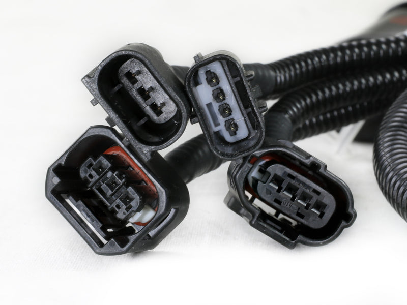aFe Scorcher Blue Module connectors for 2024-2025 Toyota Tacoma and 2025 4Runner L4 2.4L, enhancing performance and efficiency.