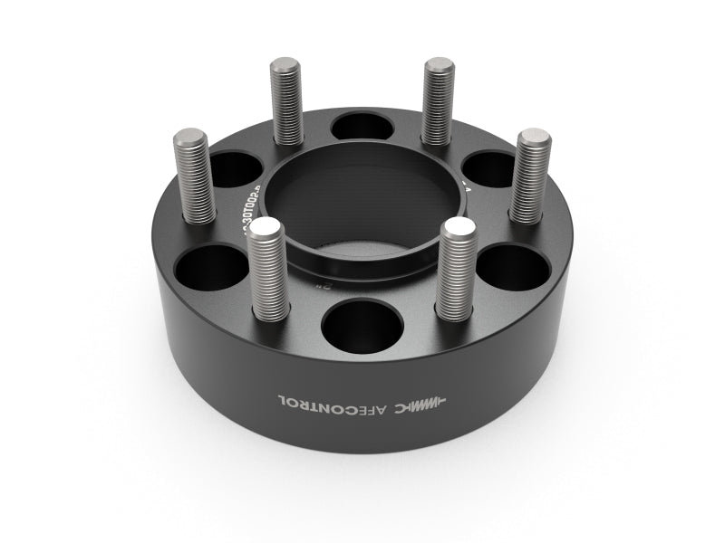 aFe CONTROL wheel spacers for Ford F-150, 2-inch thickness, 6x135mm bolt pattern, and 87.1mm center bore.