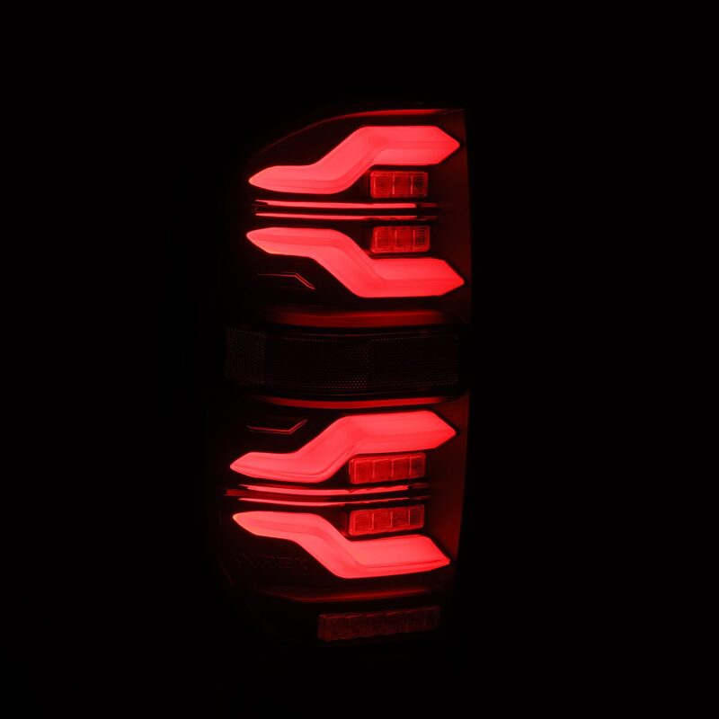 AlphaRex LUXX LED taillights for 14-21 Toyota Tundra in black with sequential signal and activation light.