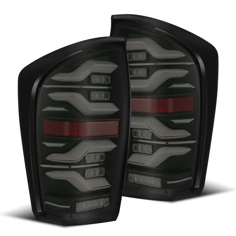 AlphaRex LUXX LED taillights for 2016-2021 Toyota Tacoma in black with sequential signal and activation light features.