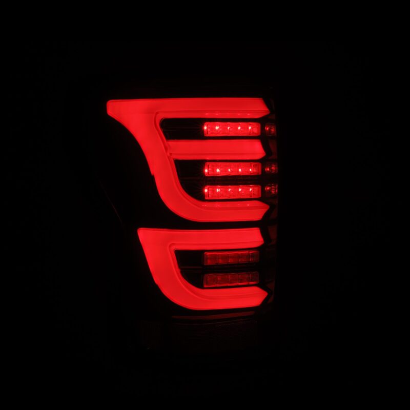 AlphaRex LUXX-Series LED tail lights for 07-13 Toyota Tundra in black and red, showcasing a sleek, modern design.