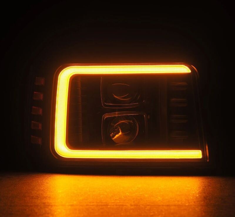 AlphaRex PRO-Series projector headlight for 92-96 Ford F-Series/Bronco with sequential signal and DRL in black finish.