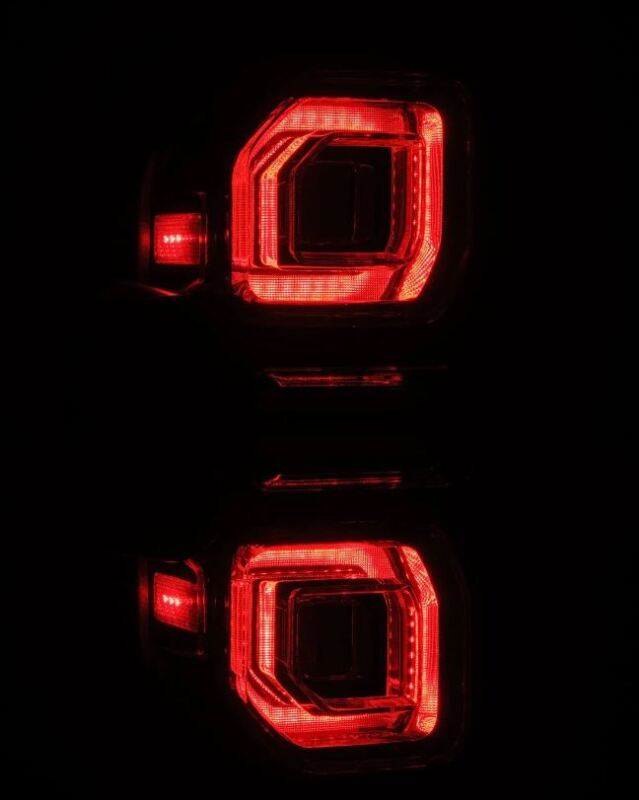 AlphaRex Nova-Series LED tail lights for 21-24 Ford Bronco in black, showcasing a sleek design with vibrant red illumination.