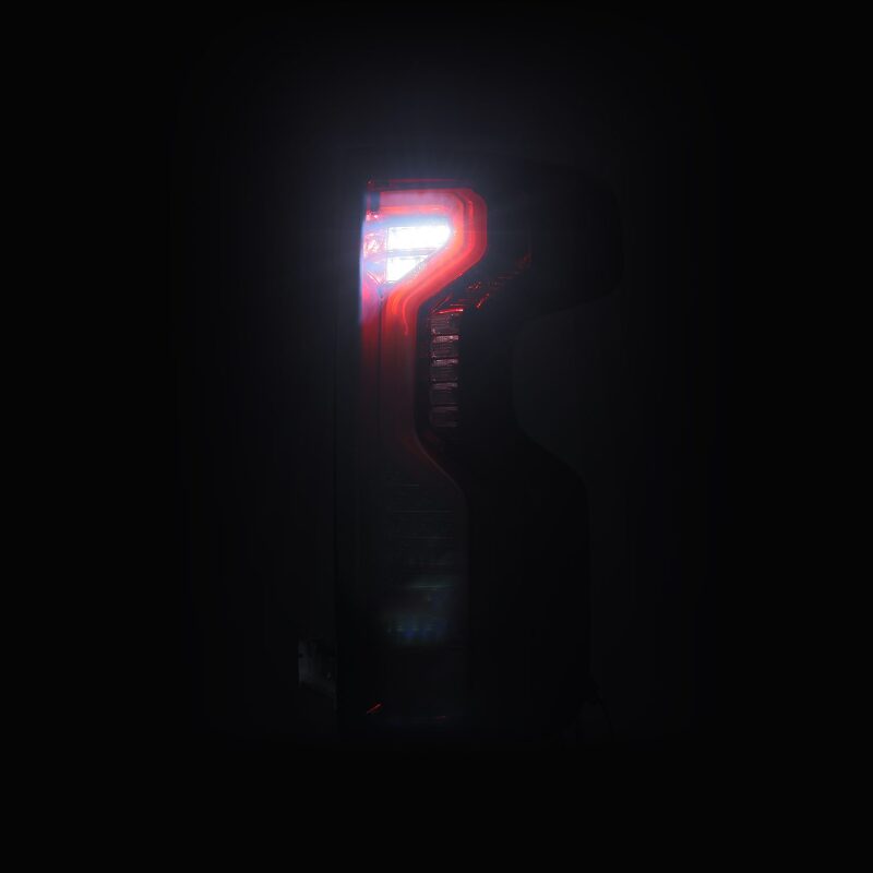 AlphaRex PRO-Series LED tail lights for 19-23 Chevrolet Silverado models, featuring a sleek red smoke design.