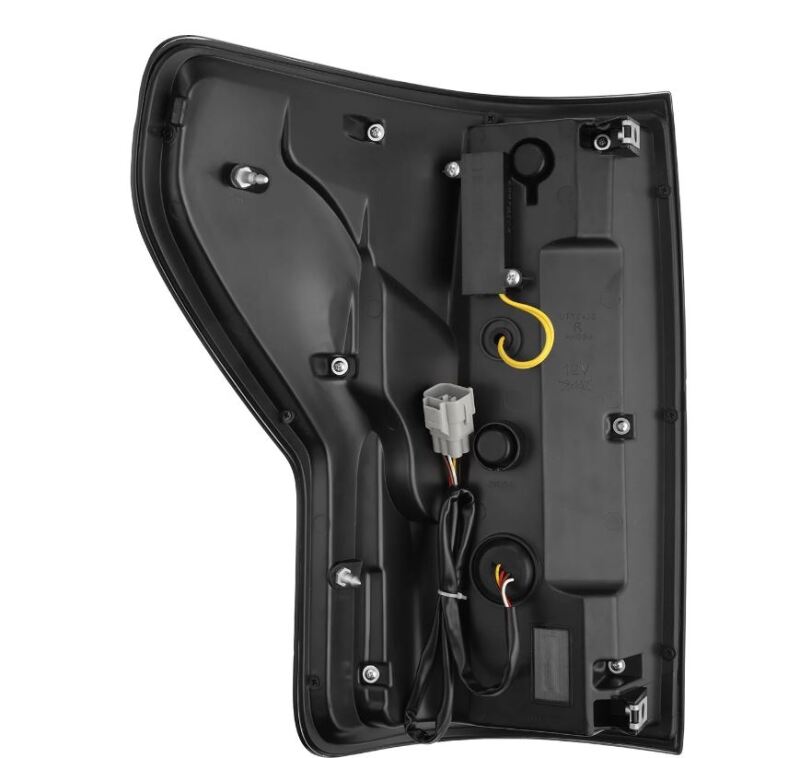 AlphaRex 07-13 Toyota Tundra Nova-Series LED tail lights in black and red, showcasing the back housing and wiring connections.