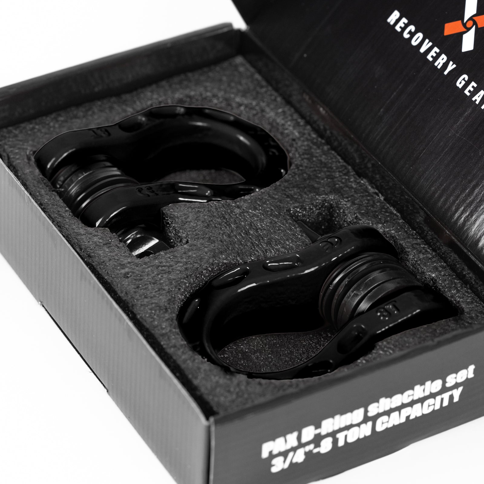 8 Ton D-Ring Shackle set in a protective foam case, designed for offroad recovery with durable black finish.