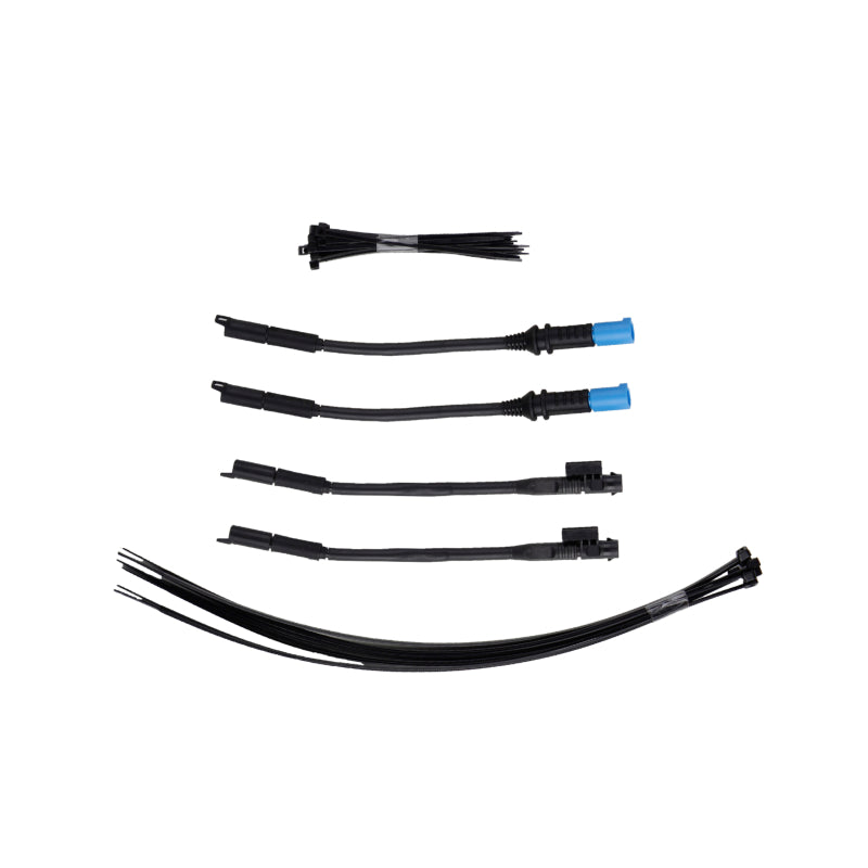 Bilstein BMW M3 G80 B1 Module for converting active suspension to passive, featuring wiring and connectors for installation.
