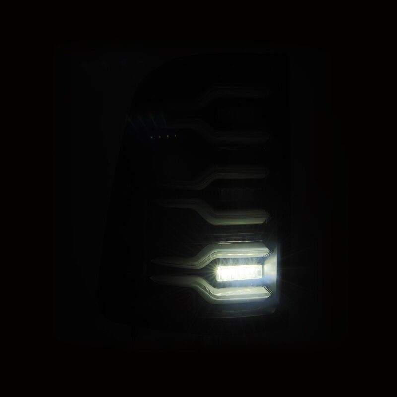 AlphaRex Luxx-Series LED tail light for 19-21 Dodge Ram 1500 in black with sequential signal and active light feature.
