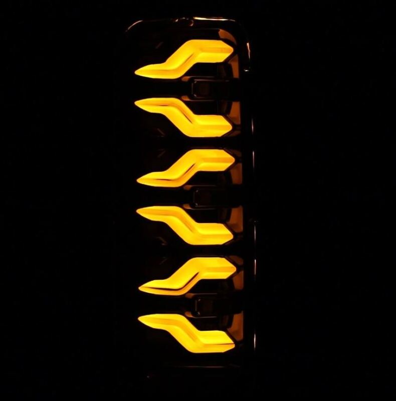 AlphaRex Luxx-Series LED tail lights for 87-96 Ford Bronco and F-150 in alpha-black with bright amber illumination.