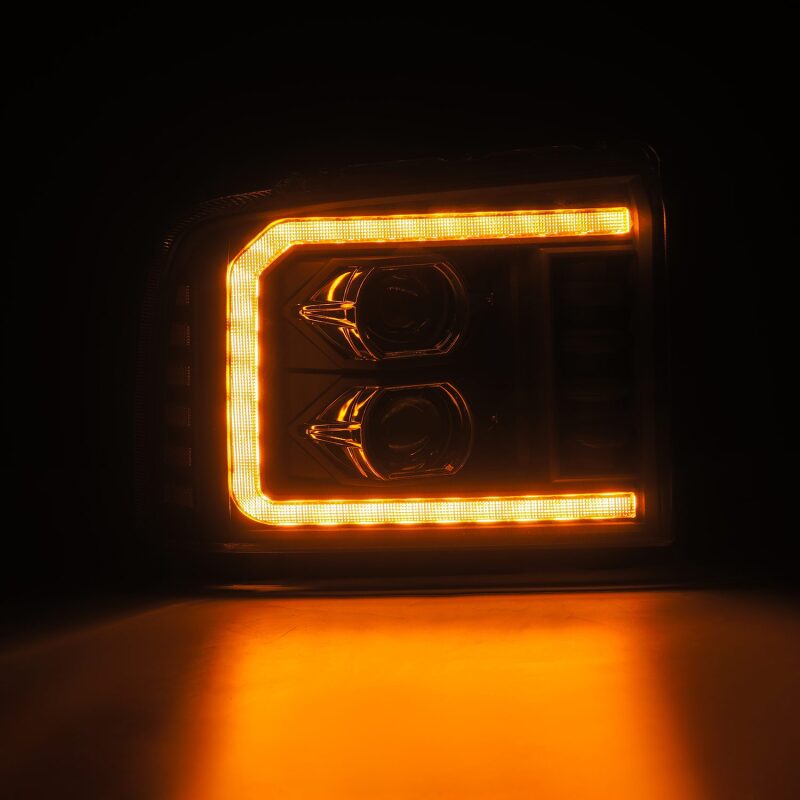 AlphaRex PRO-Series projector headlights for 05-07 Ford Super Duty, featuring sequential signals and short-width DRL.
