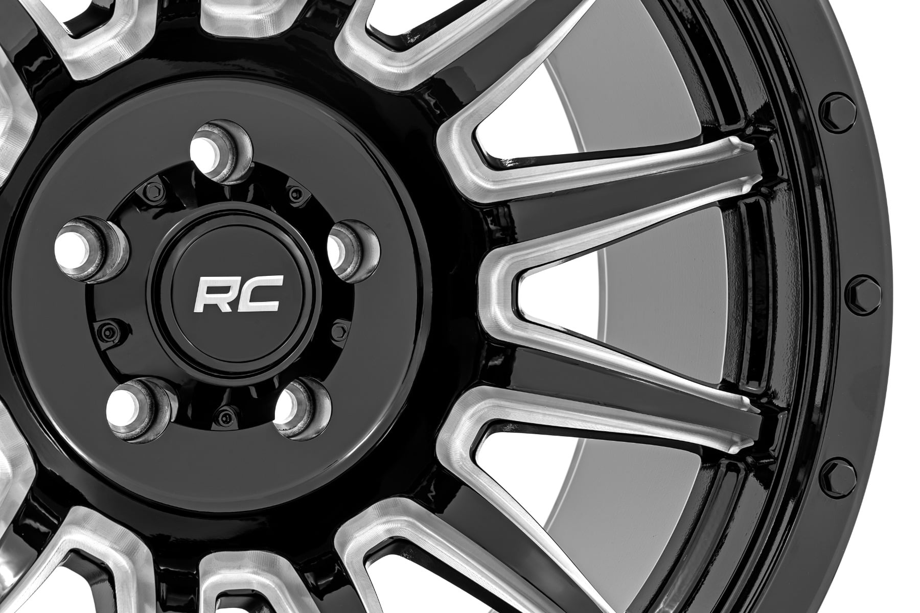 90 Series Wheel One-Piece Gloss Black w/machined spokes 20x10 6x5.5 -19mm Rough Country