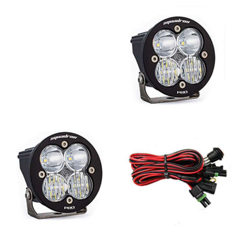 Baja Designs Squadron R Pro Driving/Combo Pair LED Light Pods with wiring harness for enhanced off-road visibility.