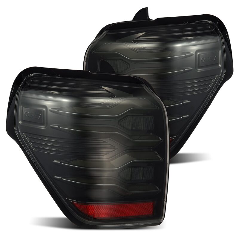 AlphaRex LUXX LED taillights for 10-21 Toyota 4Runner in black, featuring sequential signals and accent lighting.
