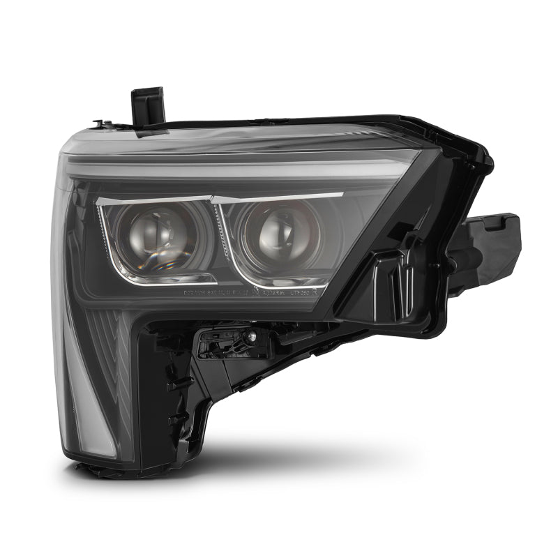 AlphaRex LUXX-Series black headlights for 2022-2023 Toyota Tundra with white daytime running lights.