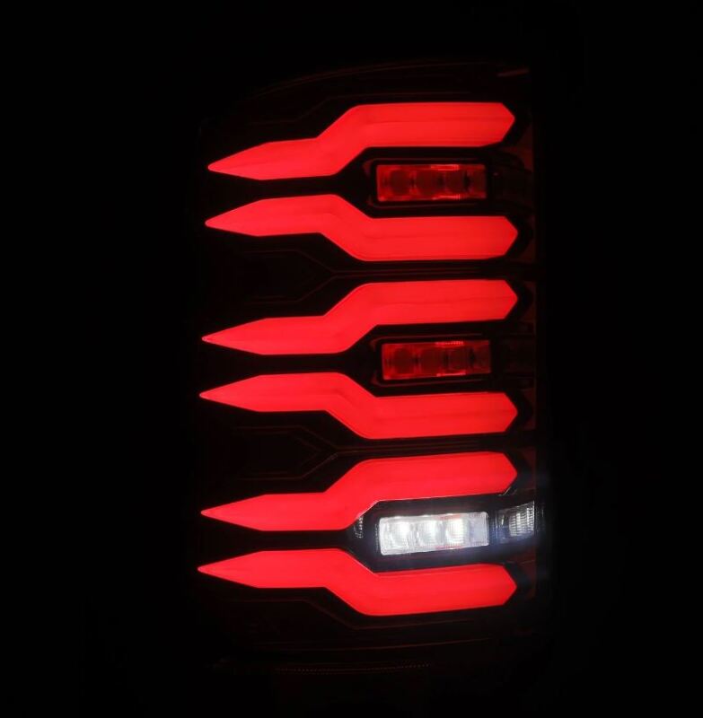 AlphaRex Luxx-Series LED tail lights for 07-13 GMC Sierra 1500 and 07-14 2500/3500HD in black and red design.
