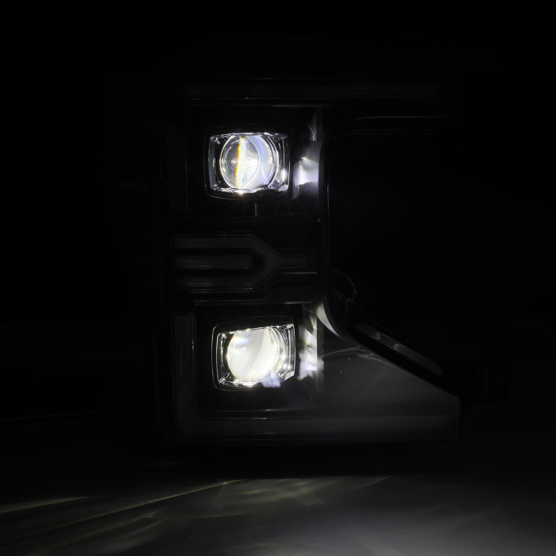 AlphaRex LUXX-Series LED projector headlights for 20-22 Ford F-250/350/450/550, featuring black housing and daytime running lights.