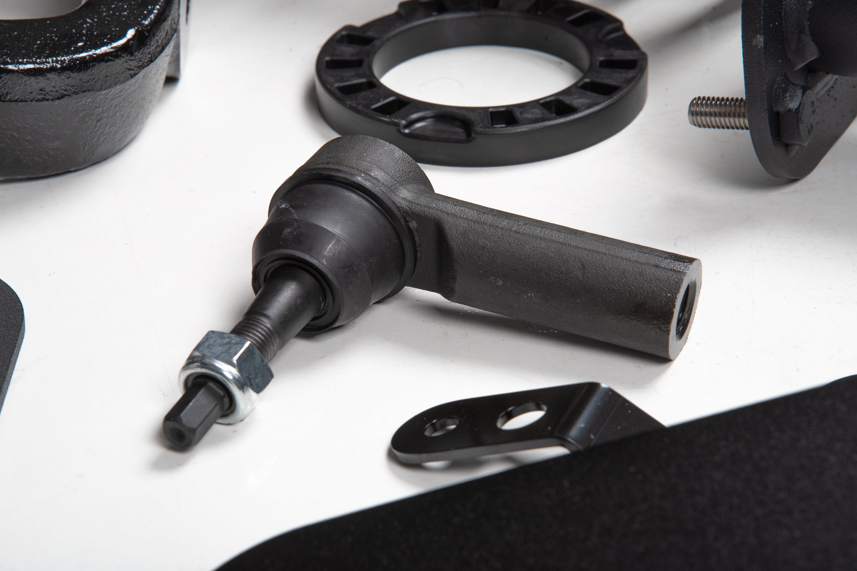 4 Inch lift kit components for Ram 1500 4WD, featuring FOX 2.5 Performance Elite coil-over parts and hardware.