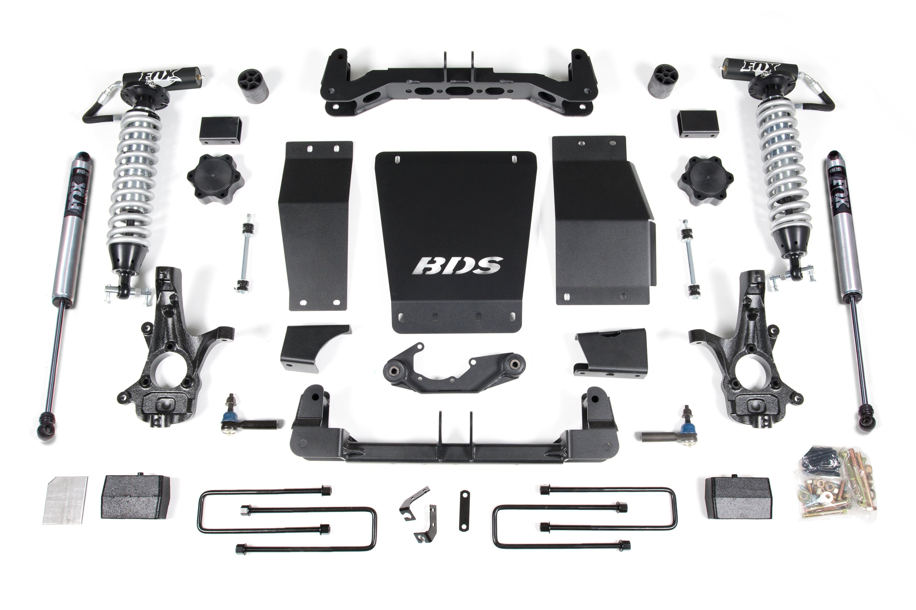 4-inch lift kit components for Chevy Silverado or GMC Sierra 1500, featuring FOX 2.5 coil-overs and installation hardware.