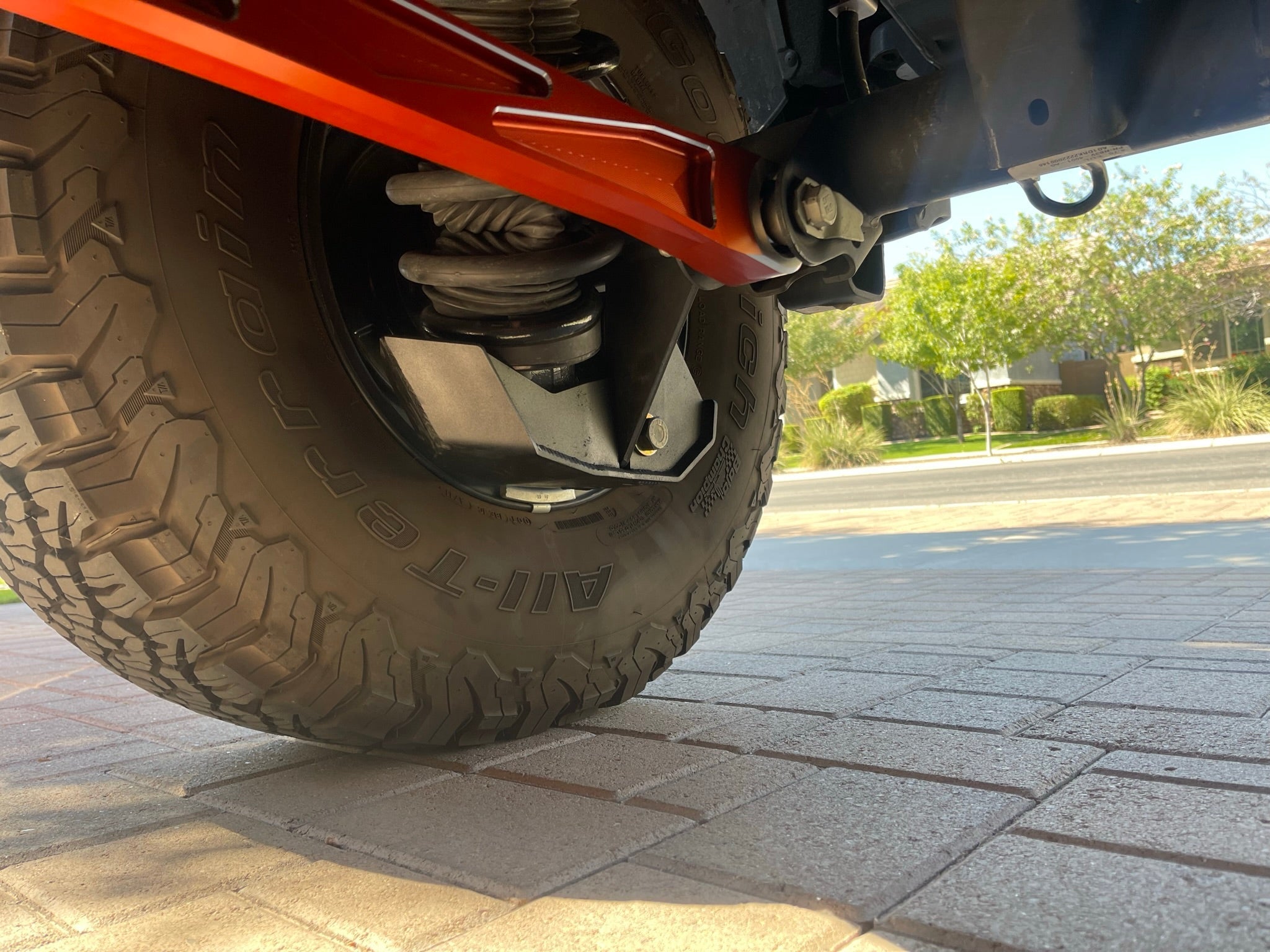 2022 and up Bronco Raptor rear shock skid kit showcasing durable protection under the vehicle's rear suspension.