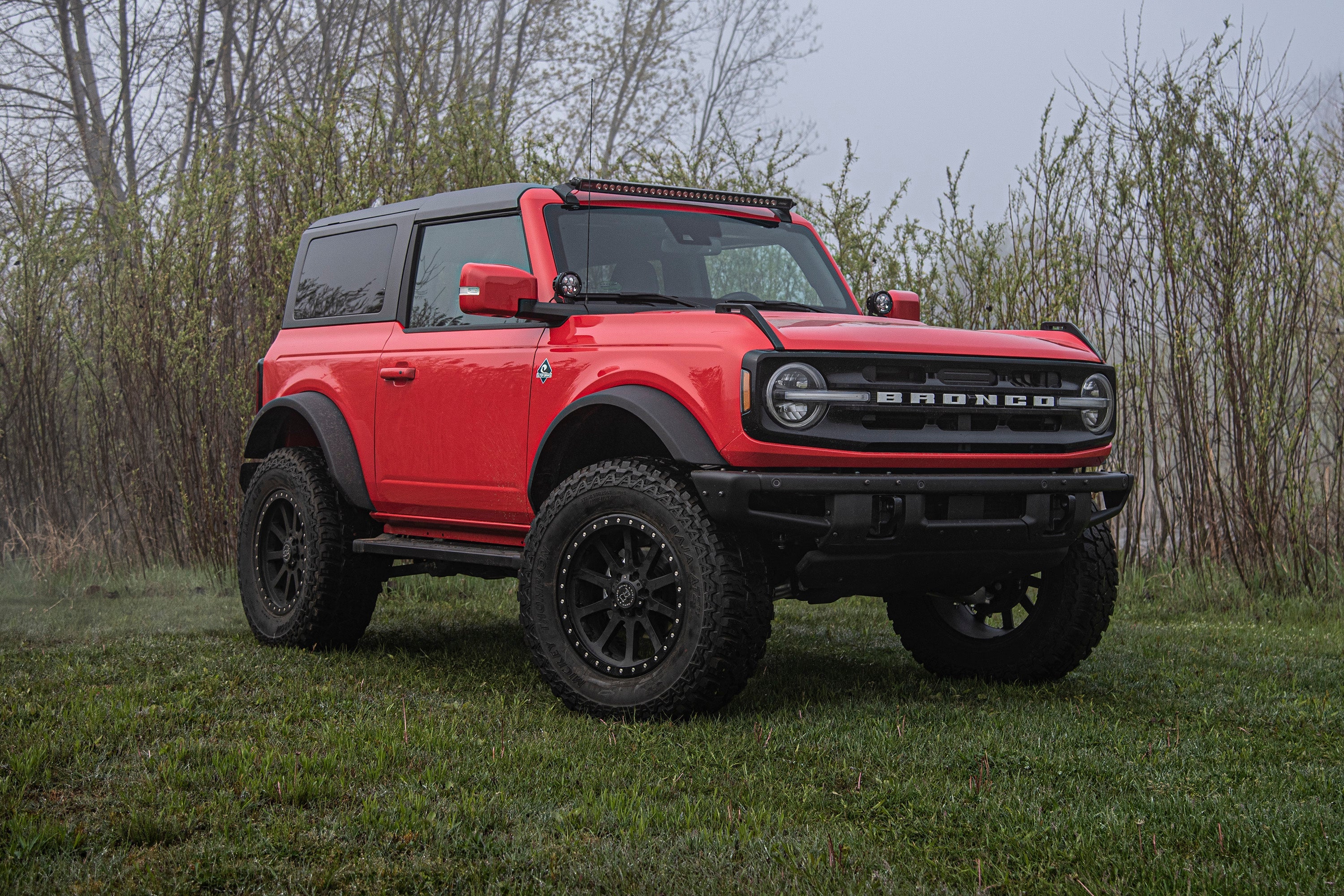 4 inch lift kit for Ford Bronco (21-25) with base shock package, showcasing enhanced off-road capability and rugged design.