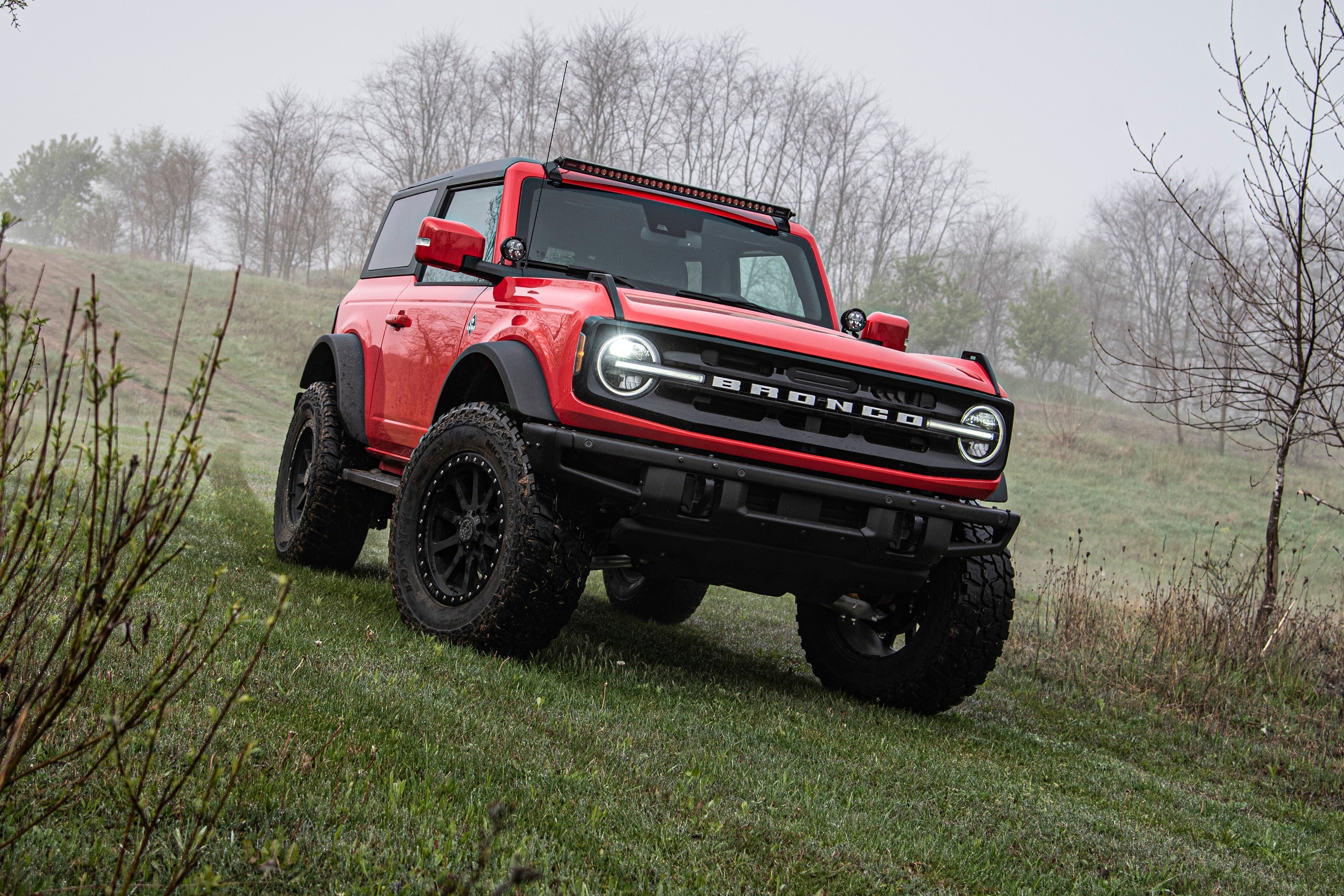 4-inch lift kit for Ford Bronco (21-25) with base shock package, showcasing enhanced off-road capability and rugged design.