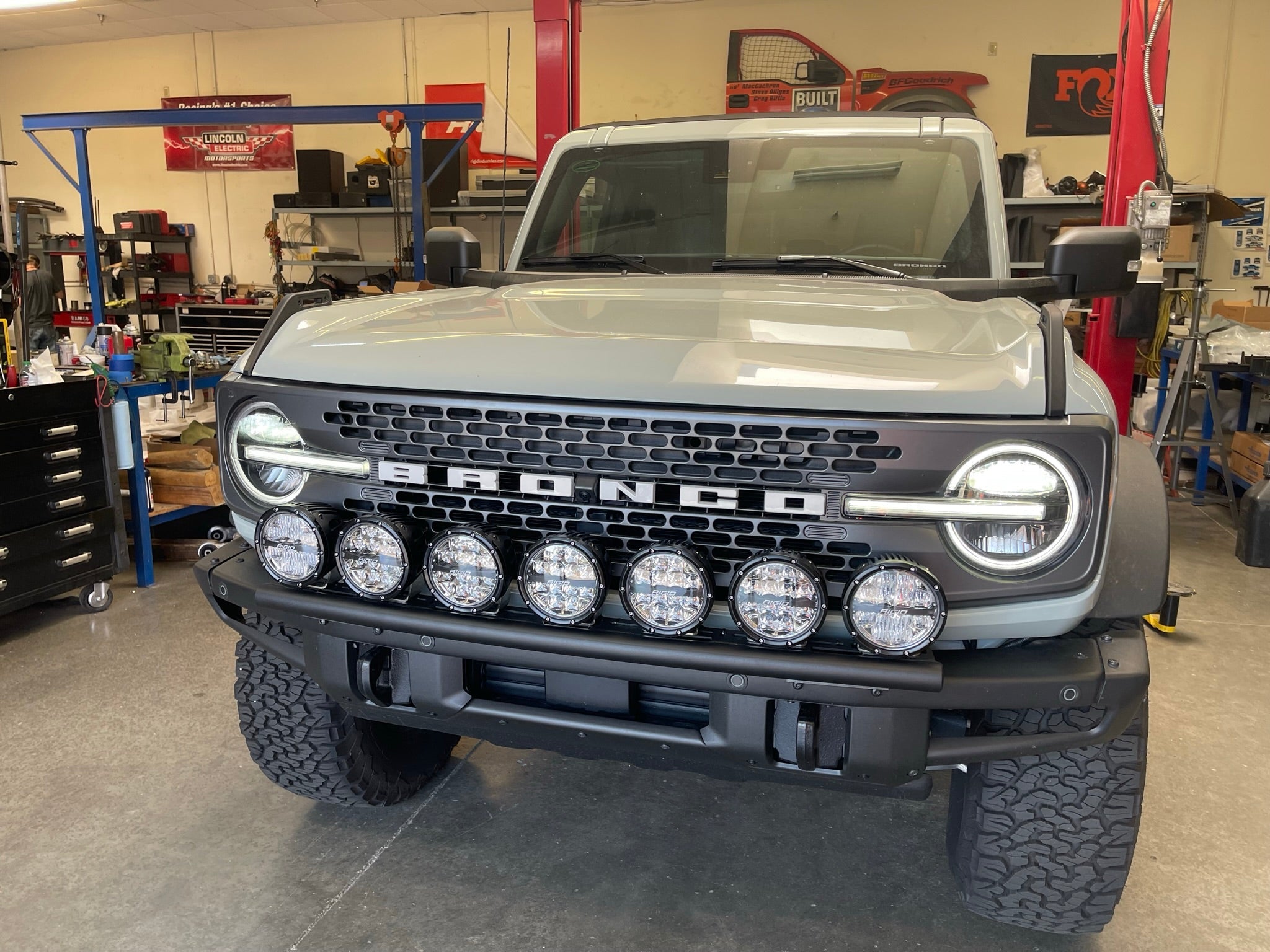 6th Gen Bronco front light mount kit installed on a modular bumper, showcasing multiple lights for enhanced visibility.