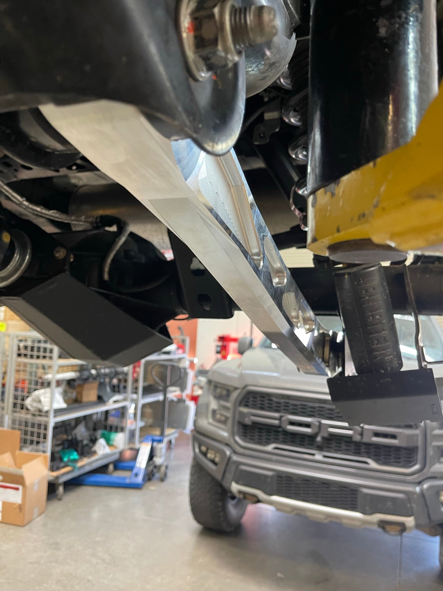 Bronco rear suspension kit featuring billet aluminum rear arms, showcasing durability and performance enhancements.
