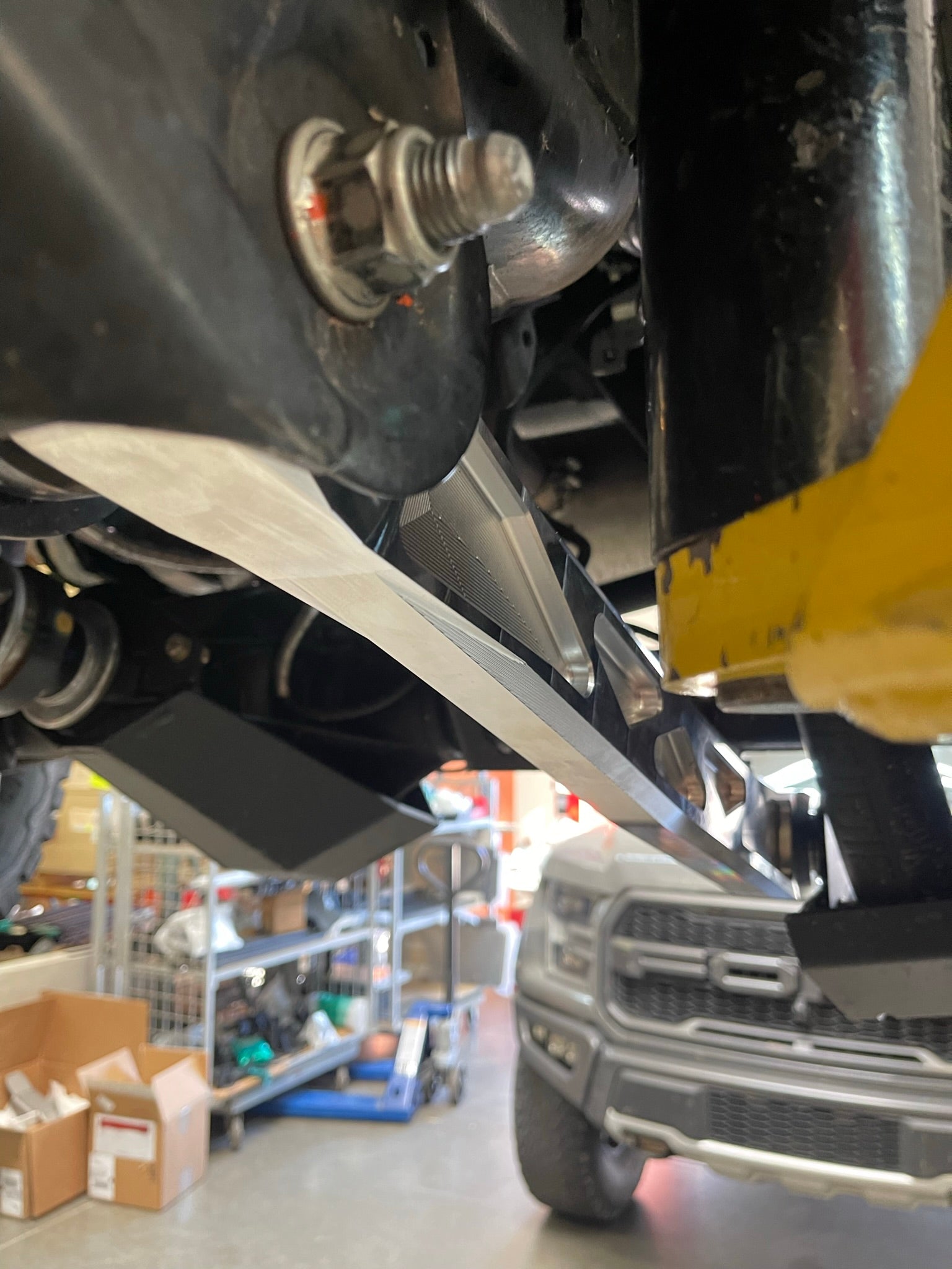 Bronco rear suspension kit featuring billet aluminum rear arms, showcasing durability and performance enhancement.