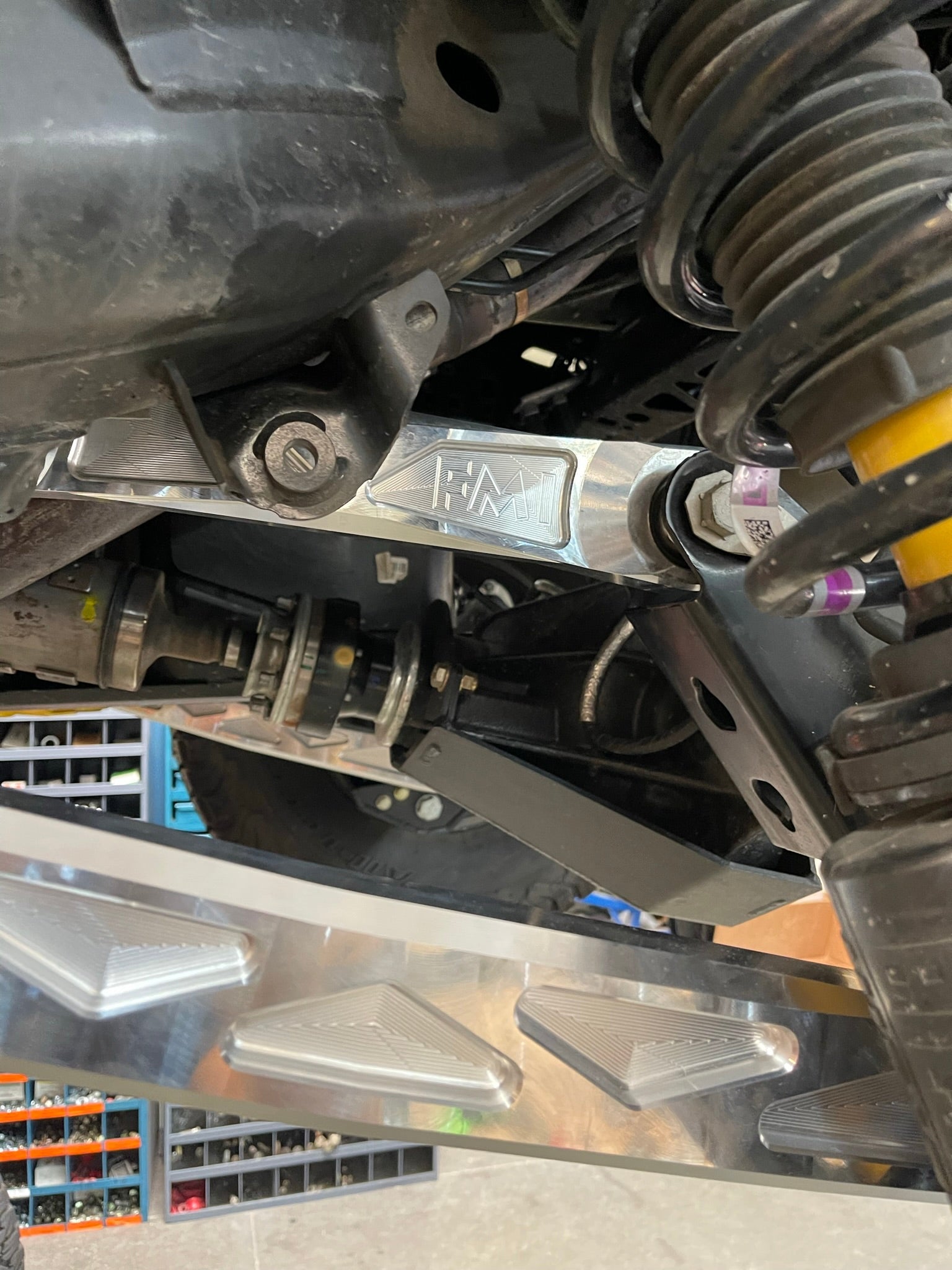 Bronco rear suspension kit featuring billet aluminum rear arms, showcasing durability and performance for offroad vehicles.