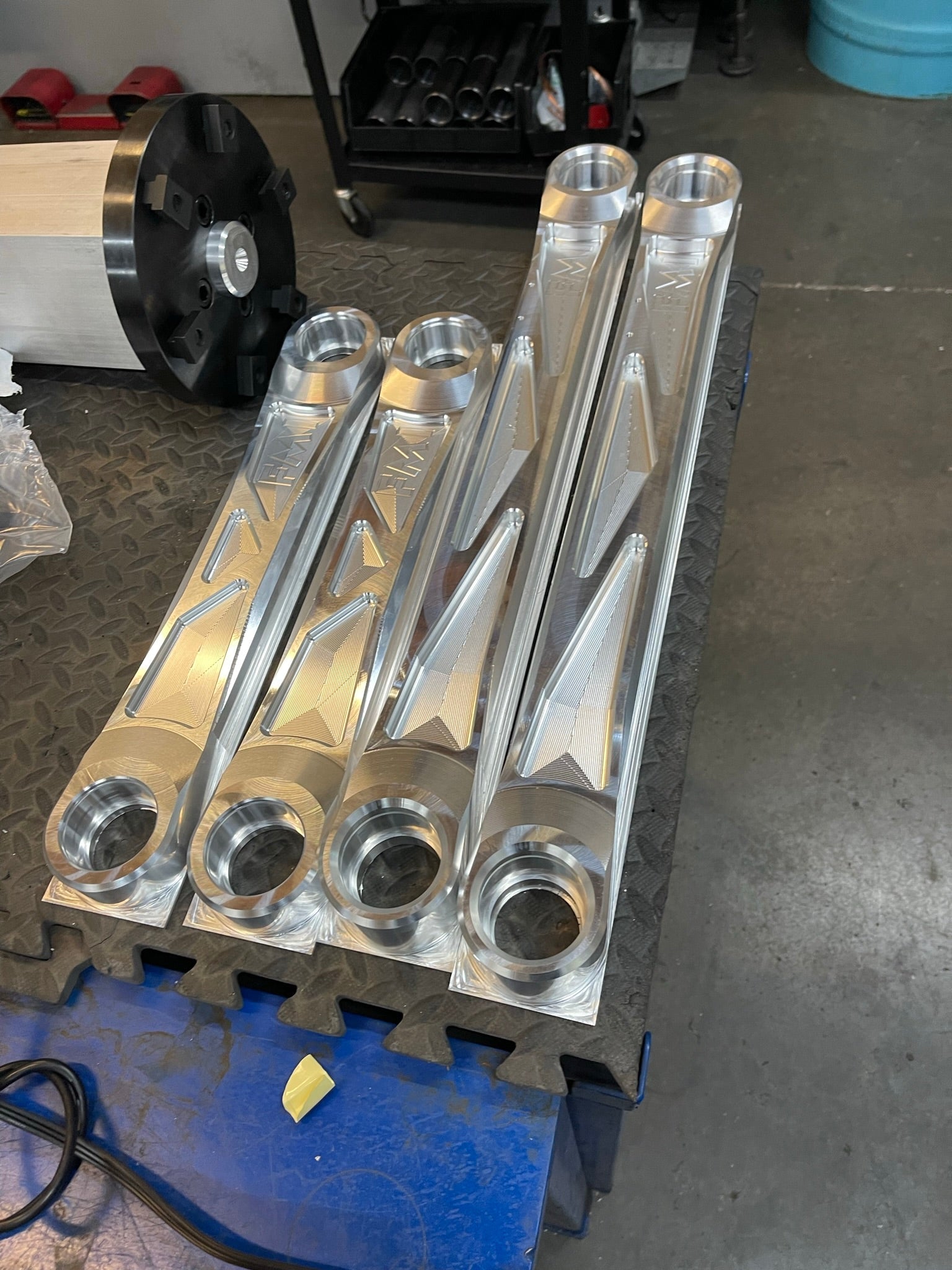 Billet aluminum rear suspension upper arms for Bronco Raptor, showcasing precision engineering and durability.